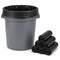 A dark gray plastic trash can with a black plastic liner inside, shown next to five rolls of black trash bags on a white background.