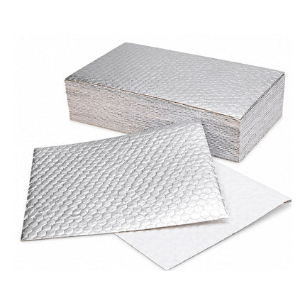 A stack of silver reflective insulation blankets with a honeycomb bubble texture, shown with one flat sheet laid out in front of the stack on a white background.