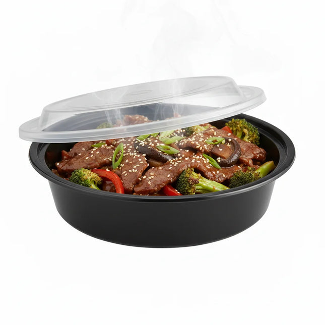 16 oz Black PP Round Food Container with Clear Lid - angled view with lid
