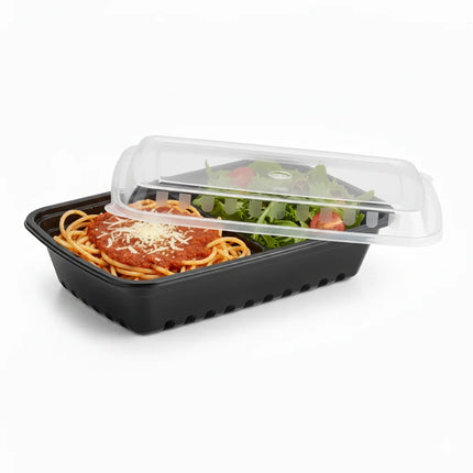 28 oz Black PP Rectangular Food Container with Clear Lid - angled view with lid