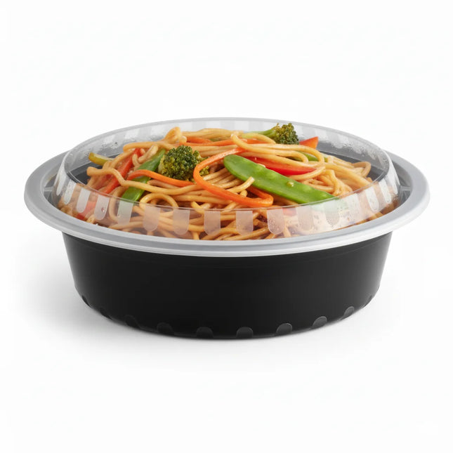 32 oz Black PP Round Food Container with Clear Lid - angled view with lid
