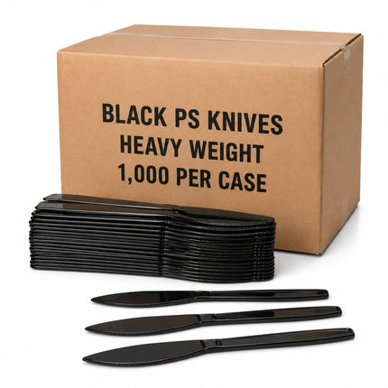 A brown cardboard shipping box labeled 'BLACK PS KNIVES HEAVY WEIGHT 1,000 PER CASE' with a stack of black plastic knives and three loose black plastic knives in front, on a white background.