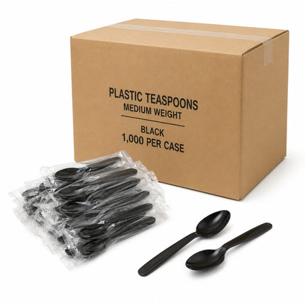 A brown cardboard box labeled 'PLASTIC TEASPOONS MEDIUM WEIGHT BLACK 1,000 PER CASE' with several individually wrapped black plastic teacups in front and two loose black teacups on a white background.