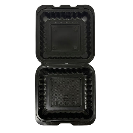 An open black plastic square food container with a hinged lid, shown from a top-down view on a plain white background.