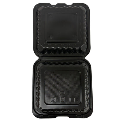 A black plastic clamshell food container shown open against a plain white background.