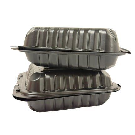 Two black plastic food containers with ribbed lids, stacked on a plain white background.