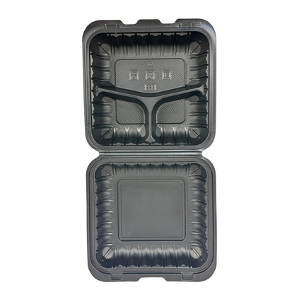A dark gray reusable plastic food container shown open, displaying both the top lid with molded compartments and the bottom tray on a plain white background.