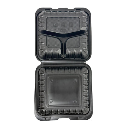 A black plastic clamshell food container shown open from above, revealing a molded tray design with a central divider and textured inner lining, on a plain white background.