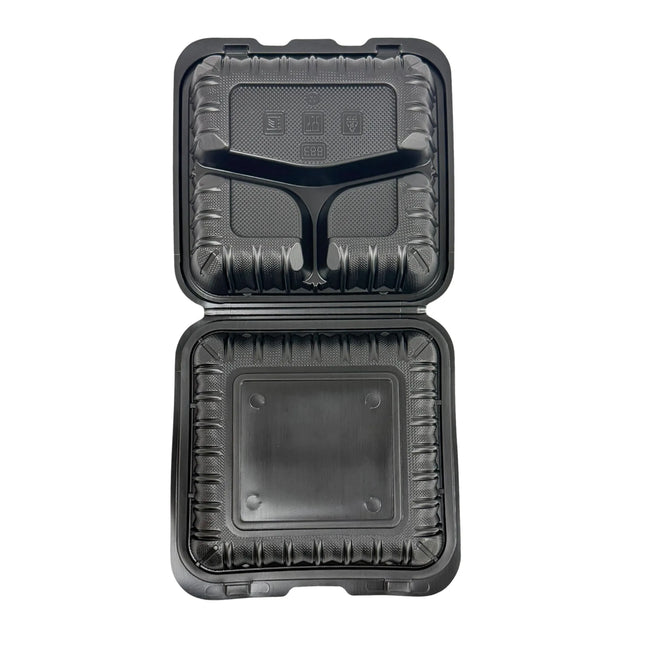 A black plastic clamshell food container shown open from above, revealing a molded tray design with a central divider and textured inner lining, on a plain white background.