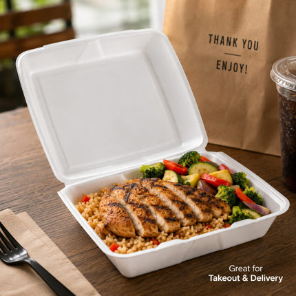 A white styrofoam takeout container filled with grilled chicken over rice and broccoli, set on a wooden table with a brown paper bag and a drink in the background.