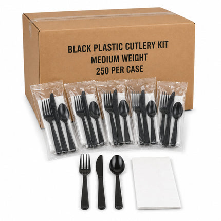 A medium-weight black plastic cutlery kit displayed with its brown cardboard box. The cutlery includes forks, knives, spoons, and white napkins, with several items individually sealed in clear plastic bags.