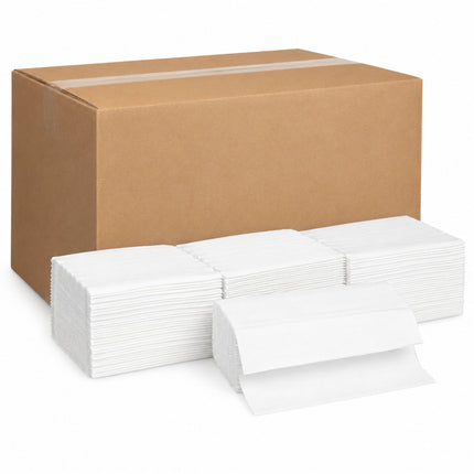 A large brown cardboard box sealed with clear tape, shown behind stacks of folded white paper napkins on a clean white background.